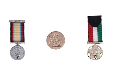 Lot 9 - Royal Mint Queen Elizabeth II gold sovereign, boxed “Behind Enemy Lines Gulf War Collection”