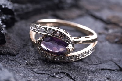 Lot 202 - A contemporary amethyst and diamond dress ring