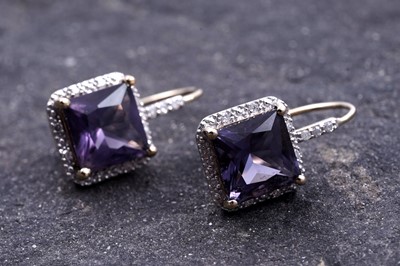 Lot 155 - A pair of contemporary amethyst and diamond pendant earrings