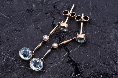 Lot 156 - A pair of Edwardian style aquamarine and seed pearl pendant earrings