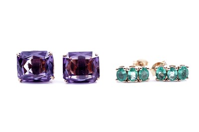 Lot 158 - A pair of emerald stud earrings; and a pair of synthetic sapphire stud earrings