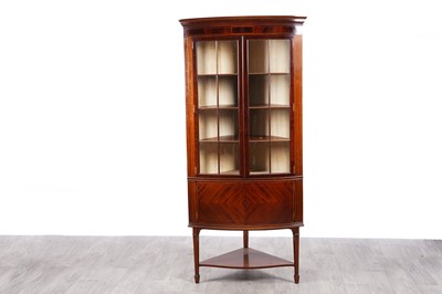 Lot 22 - An Edwardian inlaid mahogany corner cabinet