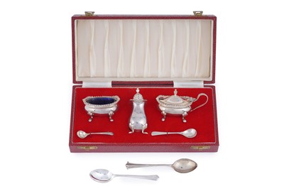 Lot 232 - A cased Elizabeth II silver condiment set; and two silver teaspoons