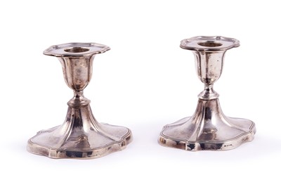 Lot 346 - A pair of Edwardian silver candlestick holders