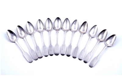 Lot 324 - A matched set of twelve George III and Victoria silver fiddle pattern teaspoons