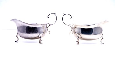 Lot 333 - A pair of George V silver sauce boats