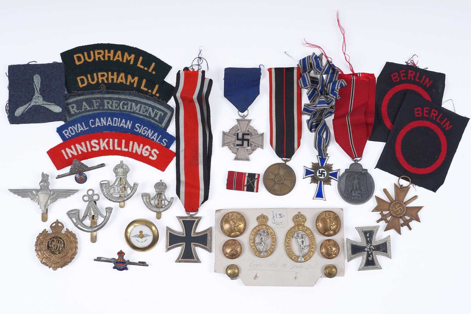 Lot 481 - A collection cloth shoulder badges and other militaria