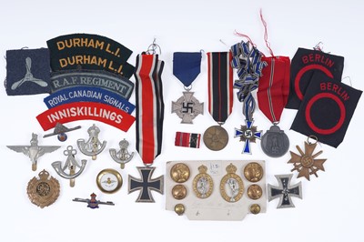 Lot 481 - A collection cloth shoulder badges and other militaria