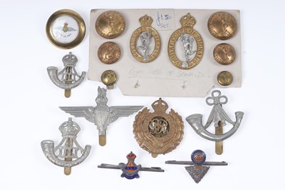 Lot 481 - A collection cloth shoulder badges and other militaria