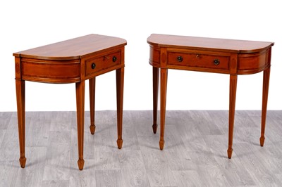 Lot 30 - A pair of reproduction Regency breakfront side tables