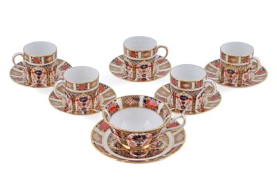Lot 268 - Five Royal Crown Derby 1128 ‘Imari’ pattern coffee cans and saucers; and a teacup and saucer