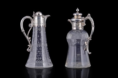 Lot 326 - Two claret jugs