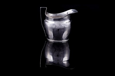 Lot 216 - A George III silver cream jug