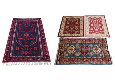 Lot 144 - A collection of four rugs
