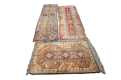 Lot 150 - A collection of two Kazakh runners and a rug