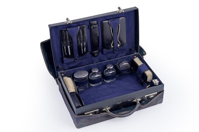 Lot 218 - A 1920s gentleman's fitted vanity case, with silver mounted toilette jars