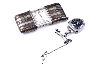 Lot 161 - A Movado Ermeto chronometer travel clock; and novelty fob watch