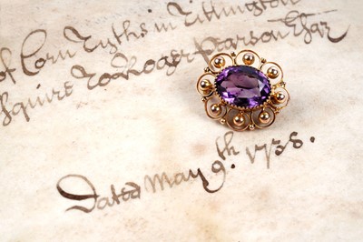 Lot 69 - An Edwardian amethyst brooch
