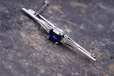 Lot 131 - An Art Deco synthetic sapphire brooch