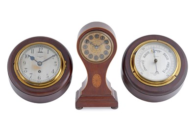 Lot 188 - Two clocks; and a barometer