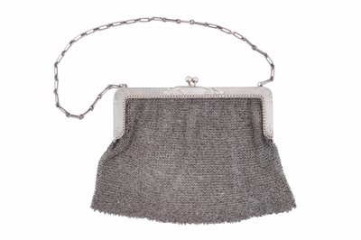 Lot 230 - A 1911 dated lady's silver mesh purse, with foliate engraved decoration