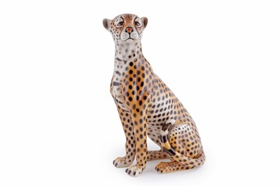 Lot 309 - A 20th Century Italian cast pottery model of a seated cheetah