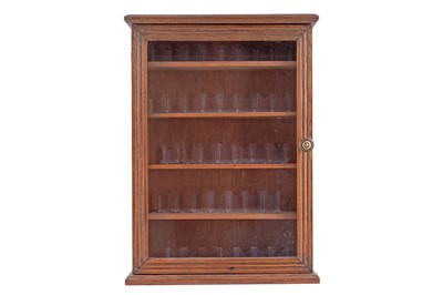Lot 95 - An Edwardian oak wall hanging display cabinet