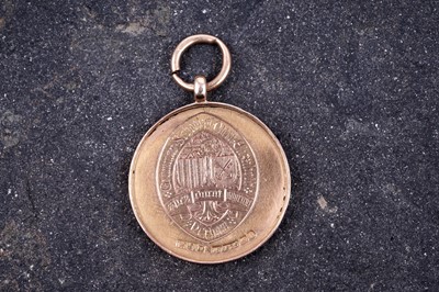 Lot 134 - A Great War period 15ct gold school prize for Hexham Grammer