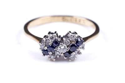 Lot 6 - A 20th Century modern sapphire and diamond ring
