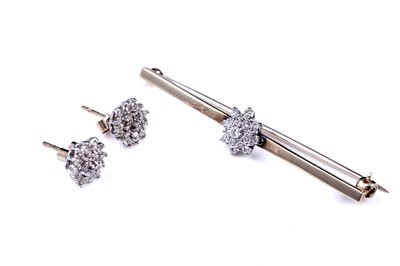 Lot 7 - A 20th Century diamond flowerhead cluster earring and brooch set