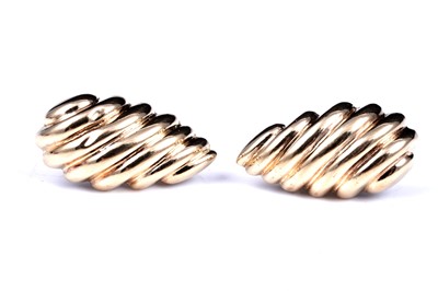 Lot 9 - A pair of 18ct gold spirally fluted stud earrings