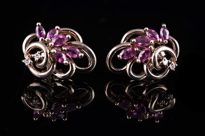 Lot 10 - A pair of 20th Century pink sapphire and diamond stud earrings