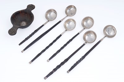 Lot 243 - Six Scottish toddy ladles; and a quaich