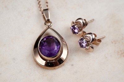 Lot 14 - A modern amethyst pendant necklace; and a pair of stud earrings