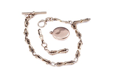 Lot 31 - An 18ct yellow gold watch chain; and a locket