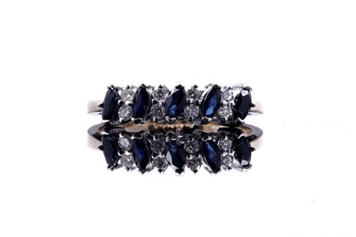 Lot 42 - A sapphire and diamond half hoop eternity ring