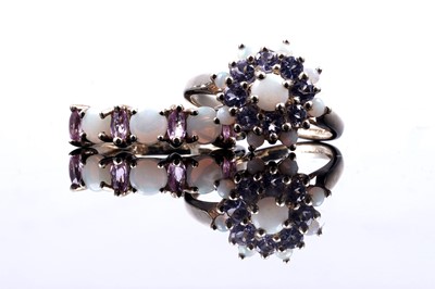 Lot 47 - A modern opal and pink sapphire half hoop eternity ring; and an opal and tanzanite cluster ring