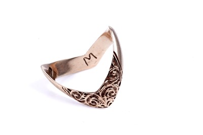 Lot 51 - An Edwardian Revival 9ct gold wishbone ring