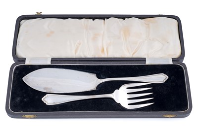 Lot 235 - A pair of silver fish servers