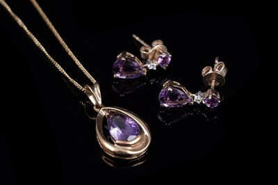 Lot 62 - An amethyst pendant necklace and earrings