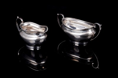 Lot 198 - A George V silver sugar bowl and cream jug