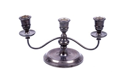 Lot 186 - An Elizabeth II silver two-branch three-light candleabrum