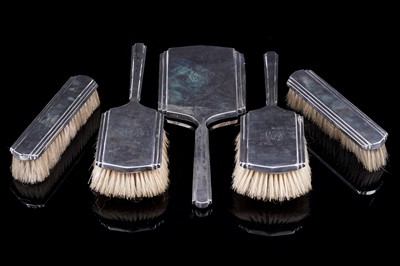 Lot 224 - A 1930s silver mirror and brush set