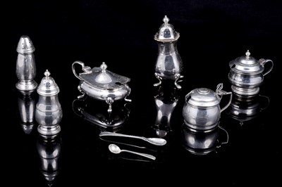 Lot 234 - Three silver cruet sets