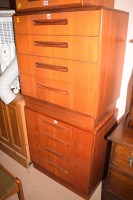 Lot 505 - A pair of G-Plan teak chests of four graduated...