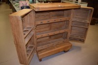 Lot 541 - A modern wooden drinks cabinet, the two flap...