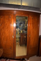 Lot 556 - An early 20th Century mahogany bowfront...