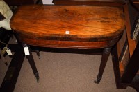 Lot 589 - A Georgian inlaid mahogany turnover top card...
