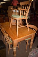 Lot 656 - A modern pine rectangular kitchen table with...