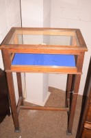 Lot 710 - An early 20th Century oak bijouterie cabinet...